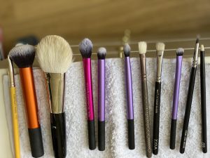 Makeup brush cleaning: reshape brush heads and allow to air dry