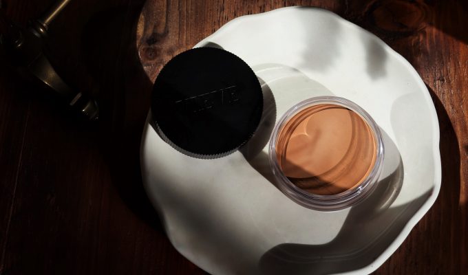 Vieve Radiance Cream Bronzer is photographed from a birdeye, beauty flatlay position. Makeup artist and beauty blogger Amy is reviewing this cruelty free makeup staple in today's post