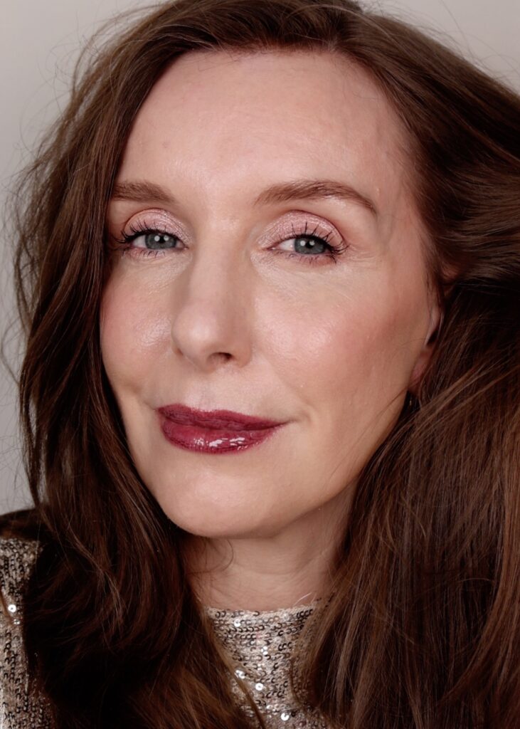 Lisa Eldridge Elevated Glow Highlighter - Amy is wearing a makeup look to show Pink Moon