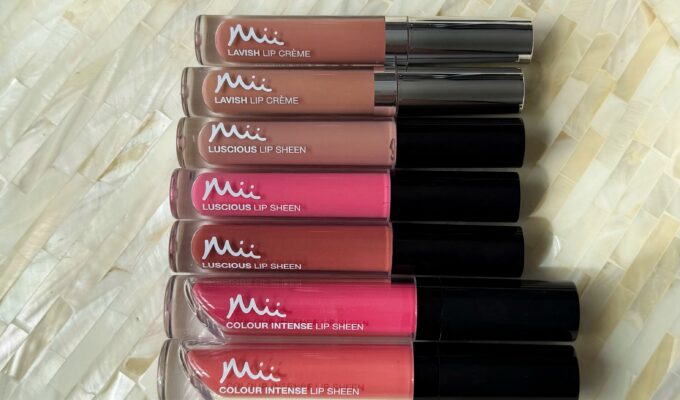 Mii Cosmetics Lip Gloss lined up ready to swatch. A range of shades from nude lip gloss to bright pink lip gloss