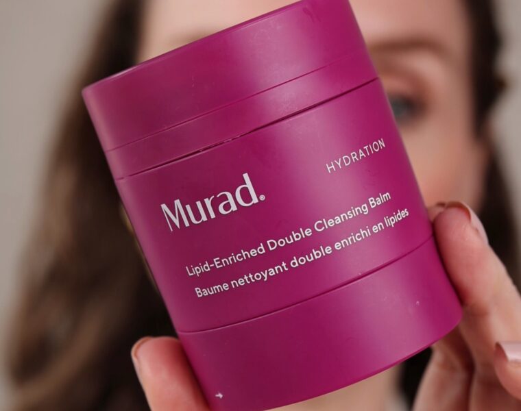 Murad Lipid-Enriched Double Cleansing Balm Review. Amy hold the vibrant pink tub
