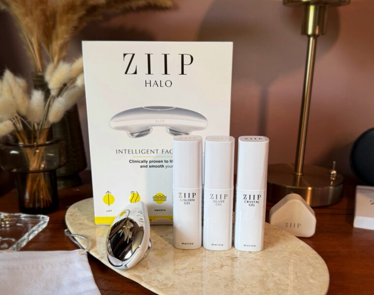 ZIIP HALO beauty device review. The microcurrent device stands on a wooden beauty vanity